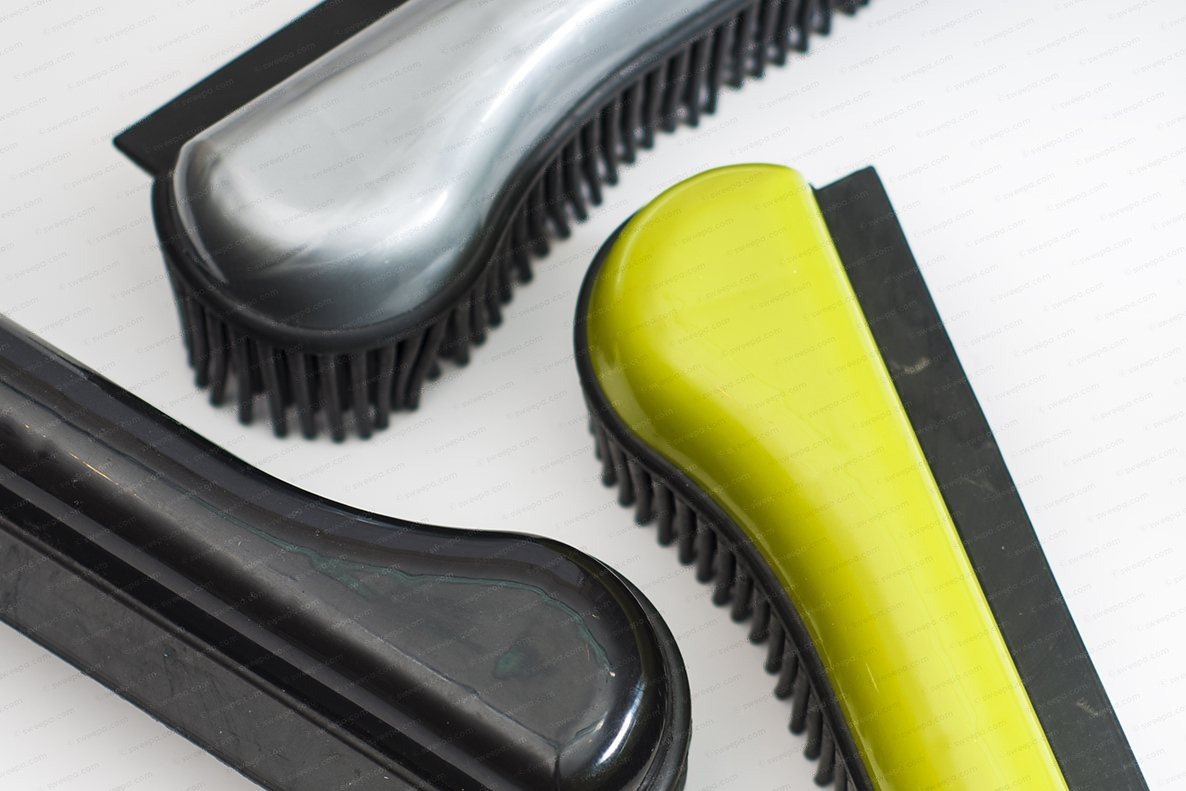 Sweepa rubber hand brushes in three colours